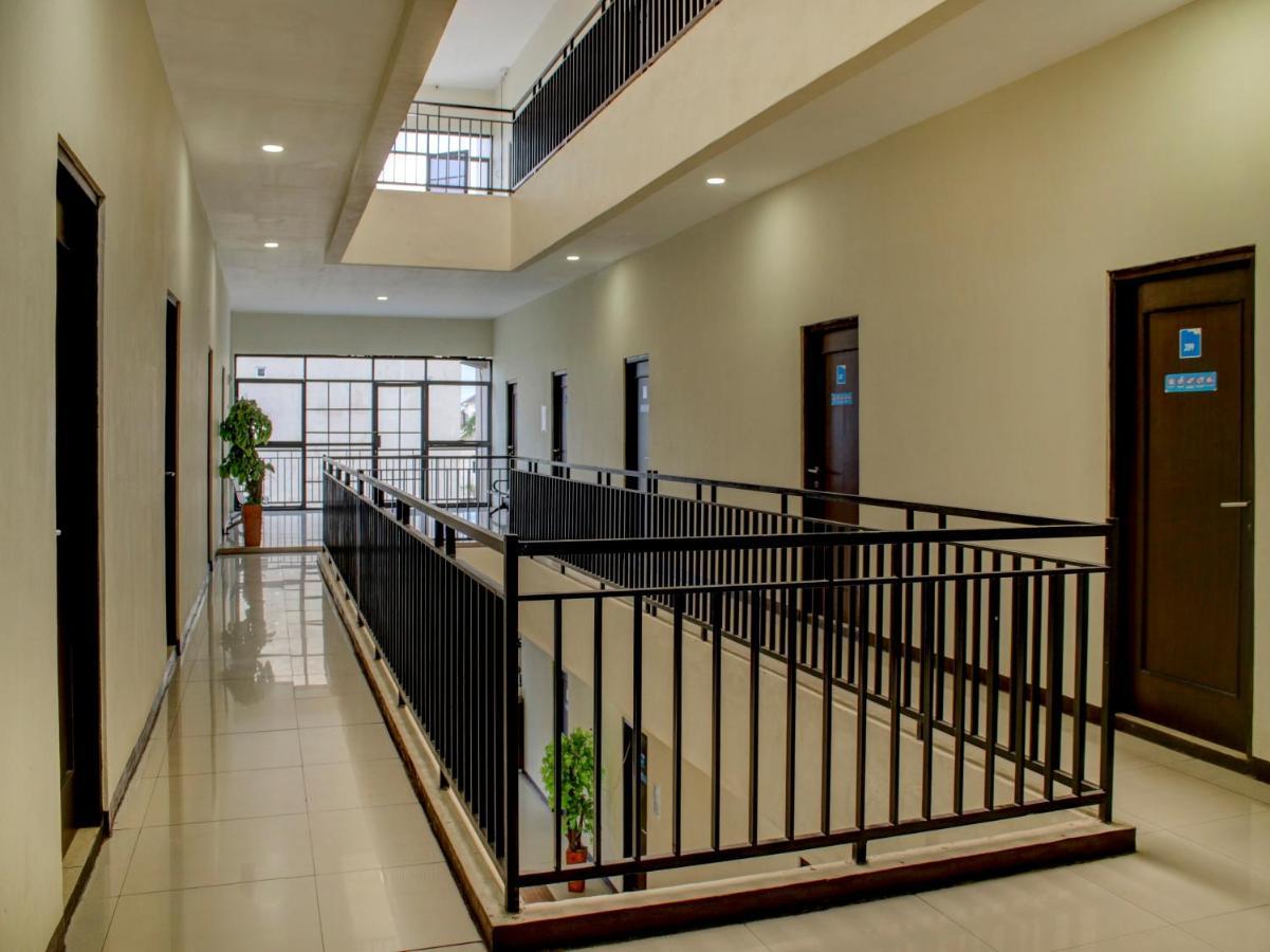 Oyo 90162 Remboelan Guest House Sungai Lutus Екстериор снимка
