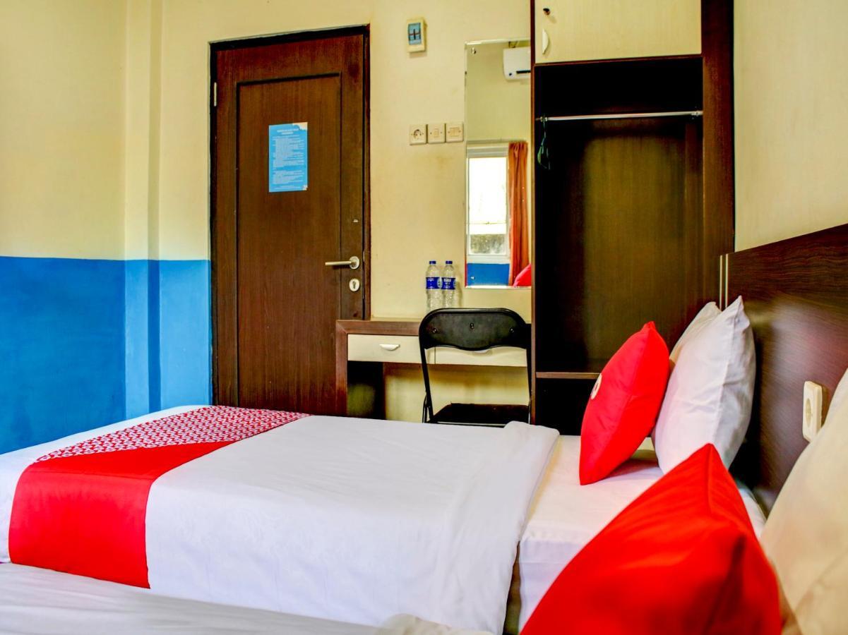 Oyo 90162 Remboelan Guest House Sungai Lutus Екстериор снимка