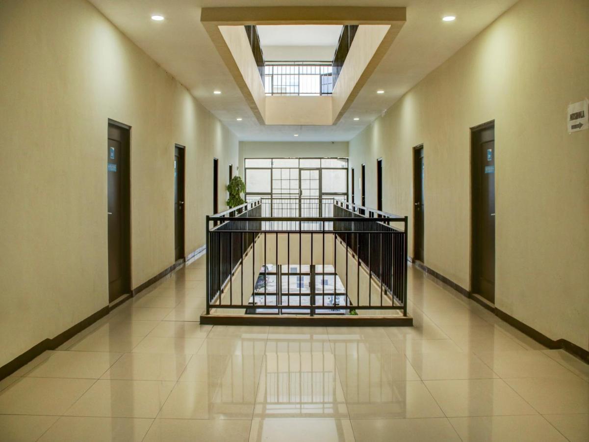Oyo 90162 Remboelan Guest House Sungai Lutus Екстериор снимка
